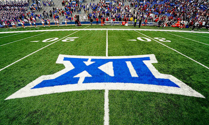 Oct 23, 2021; Lawrence, Kansas, USA; A general view of the Big 12 Conference logo on the field after the game between the Kansas Jayhawks and the Oklahoma Sooners at David Booth Kansas Memorial Stadium. Mandatory Credit: Jay Biggerstaff-USA TODAY Sports